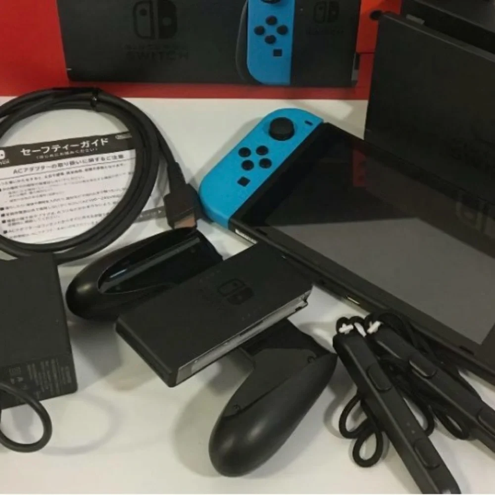 Nintendo Switch Console with Blue and Black Accessories